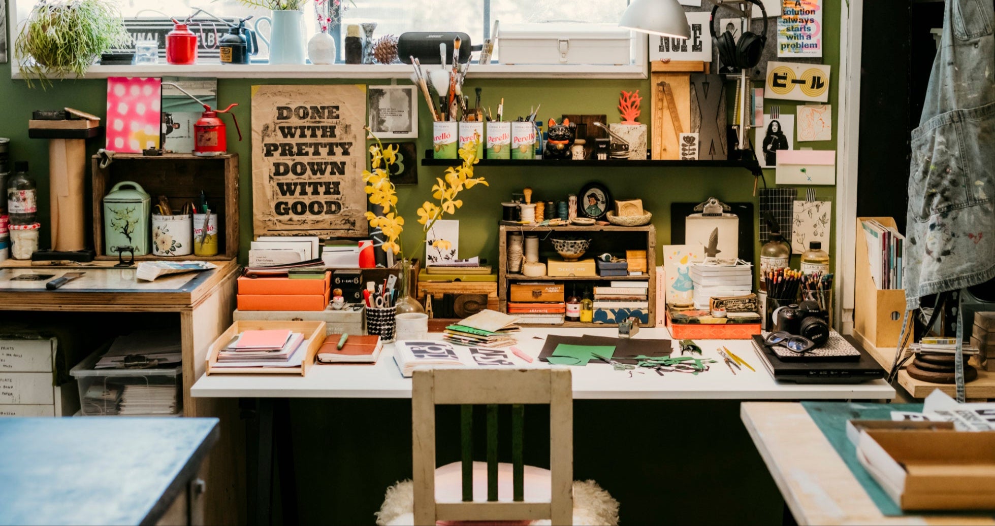Organized office space with desk, chairs, and various items.
